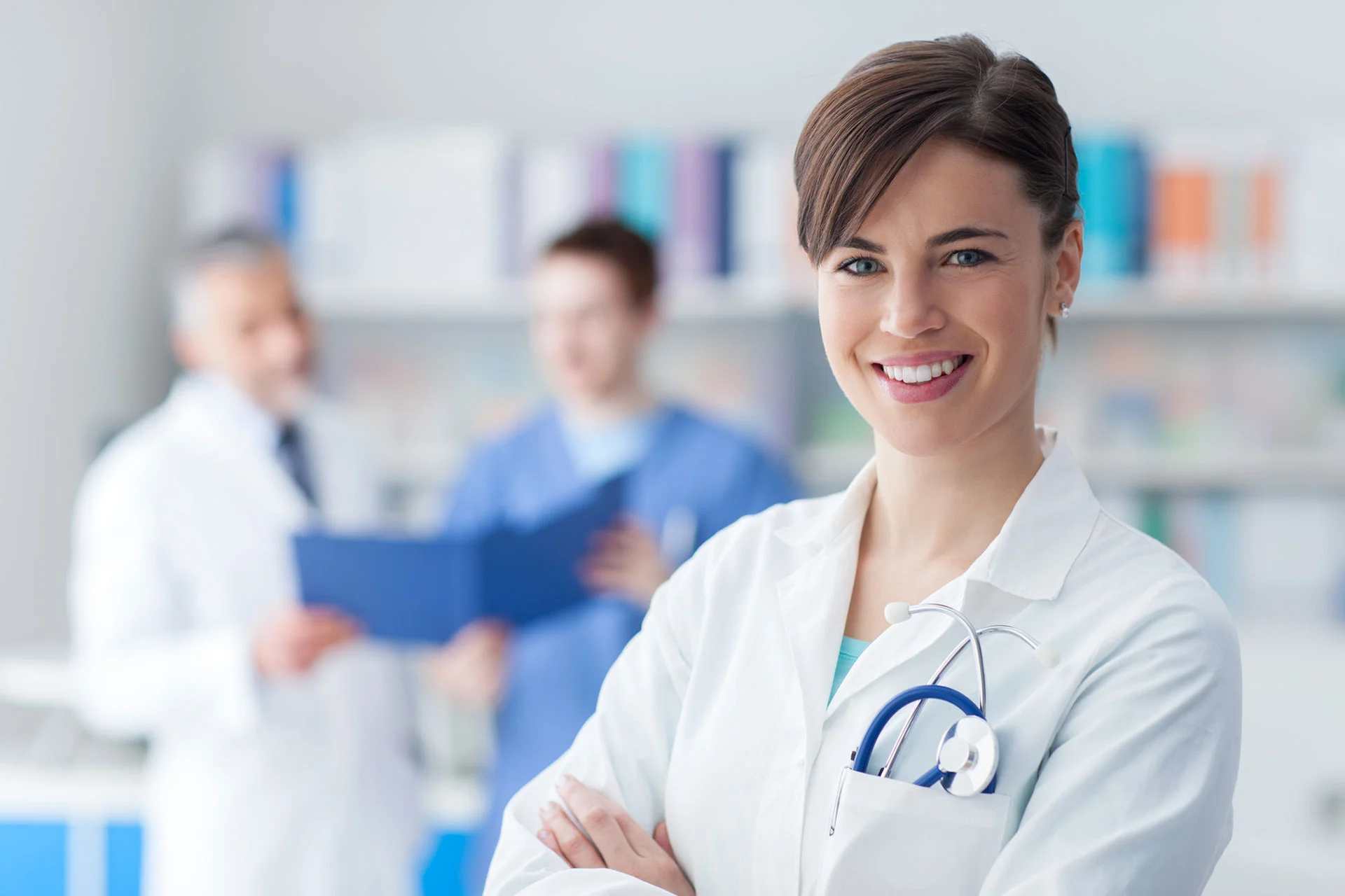 a woman in a white coat