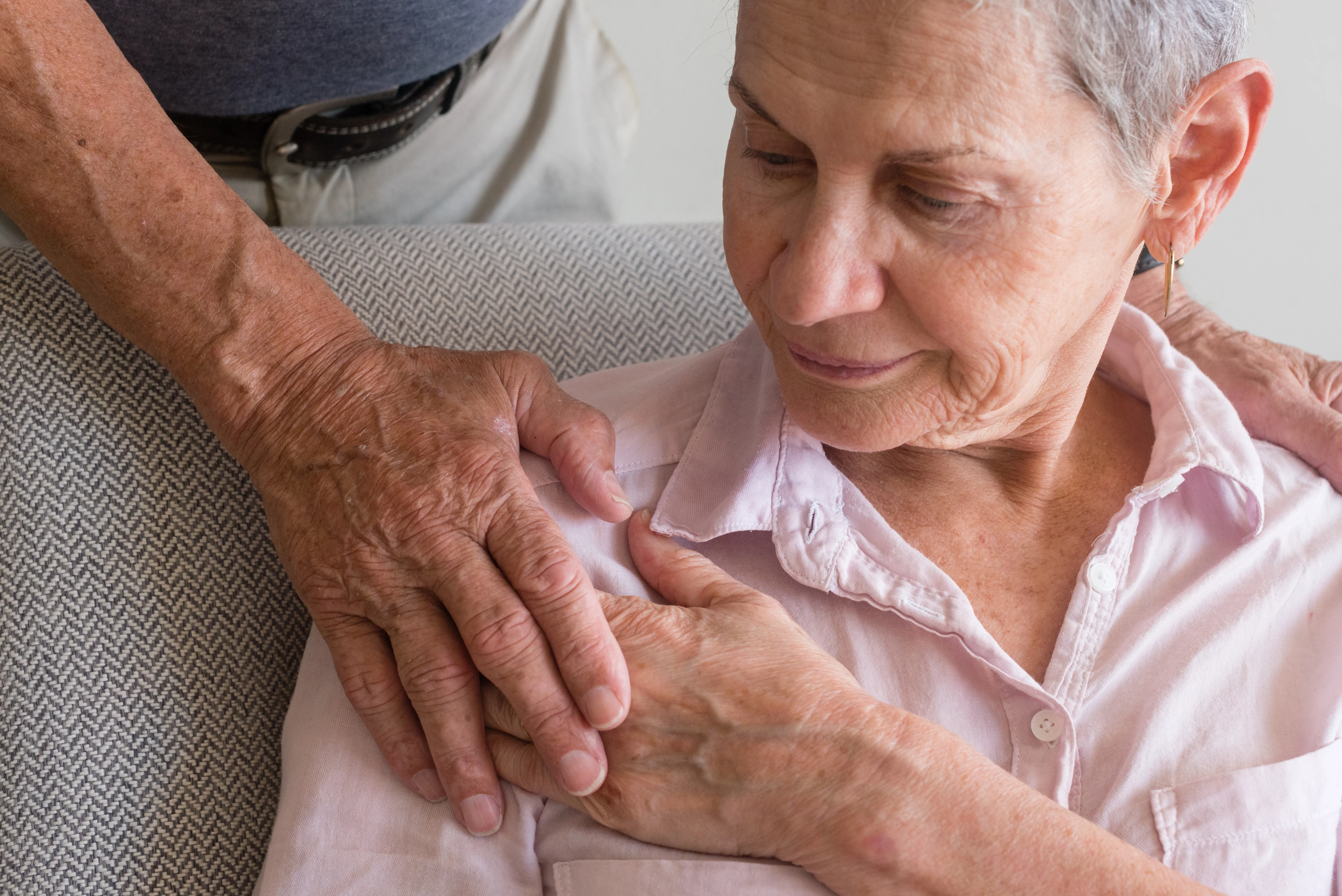 a man holding his hands together