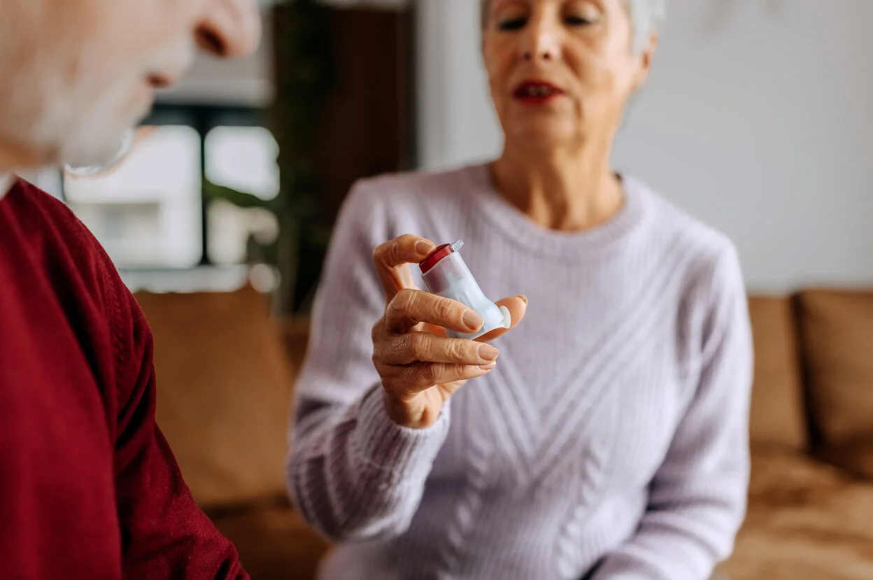 a person holding a remote control
