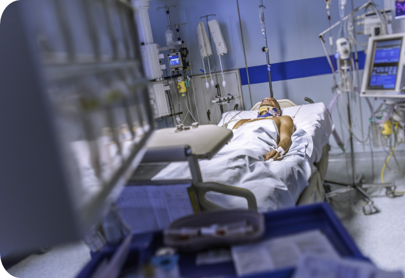 eine Person in einem Krankenhausbett